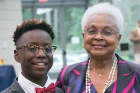 Mrs. Billye Suber Aaron speaks with Young Scholars Summer Research Institute participant during 2017 Capstone Conference in Durham, NC.